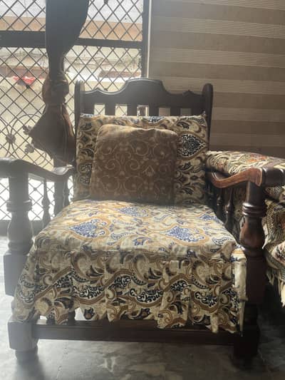 Wooden sofa set with cushions