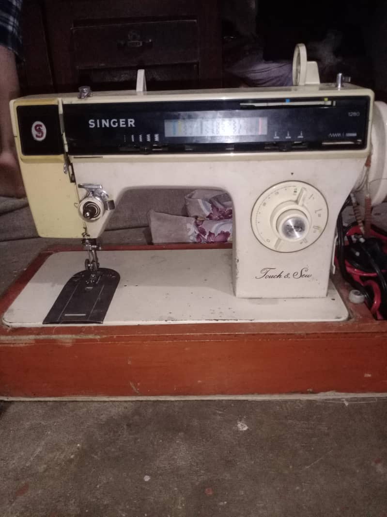 singer machine 3