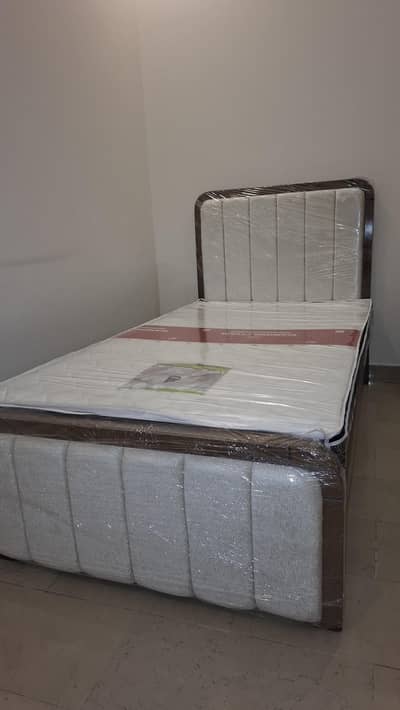 Brand new wood single bed with mattress