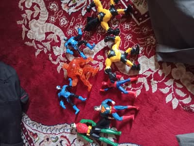Different action figures marvel smurf chipmunks ninja turtle