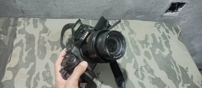 DSLR Lumix FZ 1000 with Card and  2 batteries
