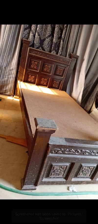 wooden single bed