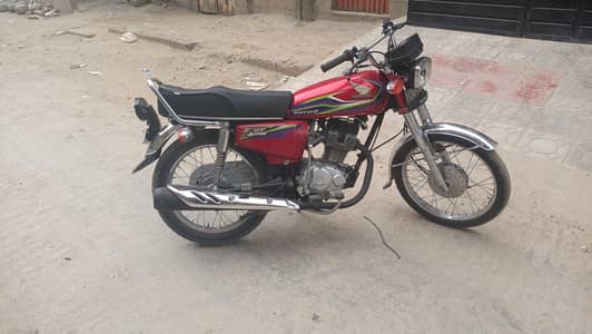 Honda 125 Lahore number 17 model all okay genuine