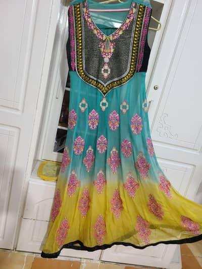 Beautiful sleeves Anarkali style dress with a lot of festive