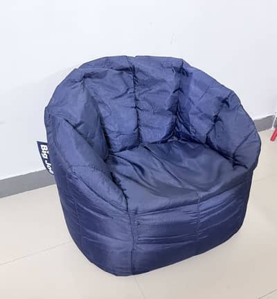 Bean bags and wooden rocking chair for sale