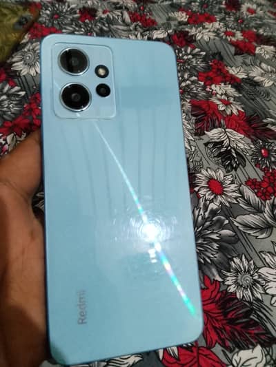 Xiaomi Redmi Note 12.                          (8GB RAM 128GB storage)