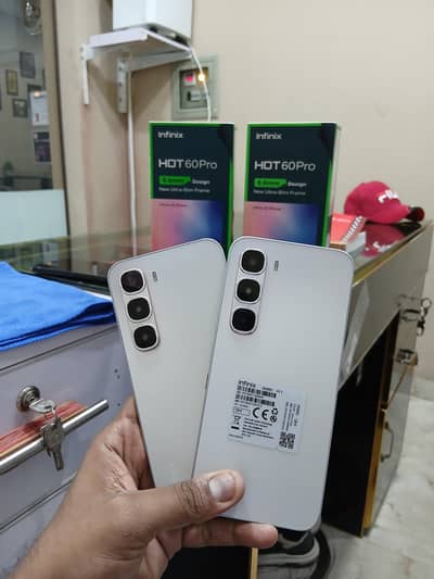 infinix Hot 60 pro 8Gb 128gb (7 month war ) complte box 10/10 Conditin