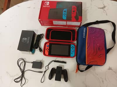 Nintendo Switch V1 full bundle+256GB MicroSD+BONUS EMIRATES POUCH
