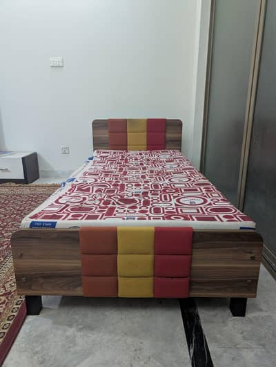 Bed and study table with chair