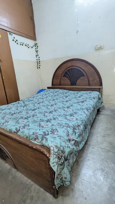 Wooden double bed