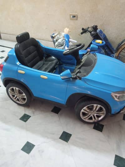 Kids car for sale saudia import electric with door open