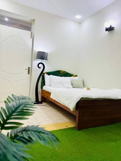 2 BED FURNISHED FLAT FOR RENT 11 CENTRE PLAZA G-11 ISLAMABAD ALL FACILITY AVAILABLE