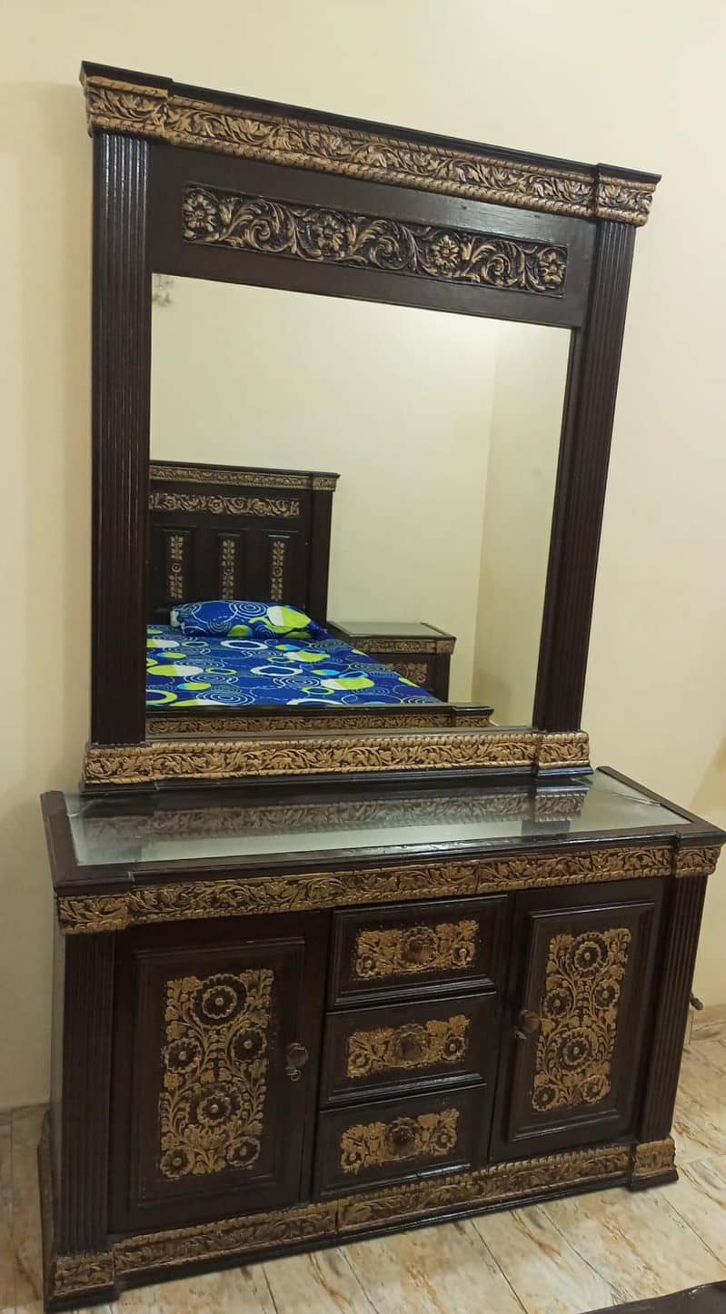 Bed, 2 side tables, dressing table. 1
