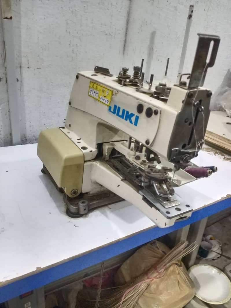 Button machine Juki chaina 2