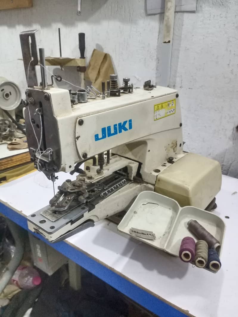 Button machine Juki chaina 3