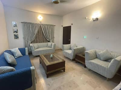 7 seater sofa set with 1 center table and 2 side tables and 3 curtains