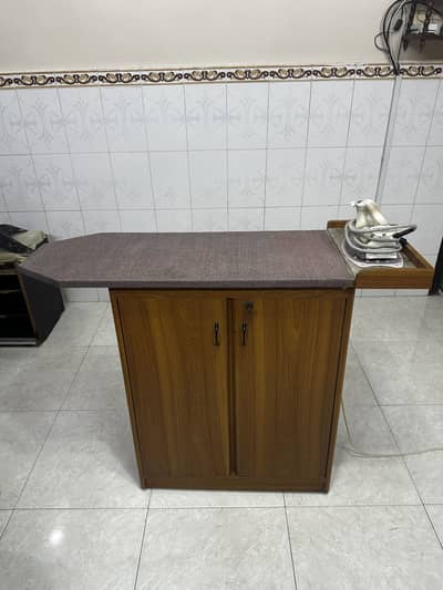 Iron table with cupboard