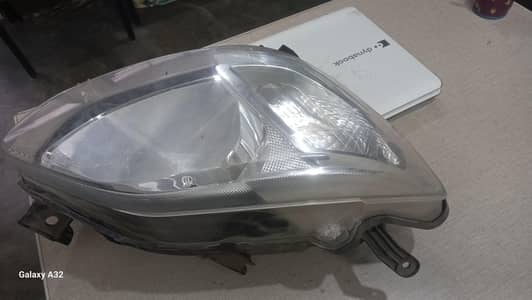 Driver Side , Repaired Headlight , Toyota Passo