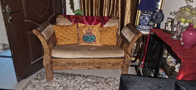 Wooden hand carved swati sofa