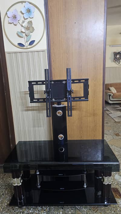 Elegant glass table television stand