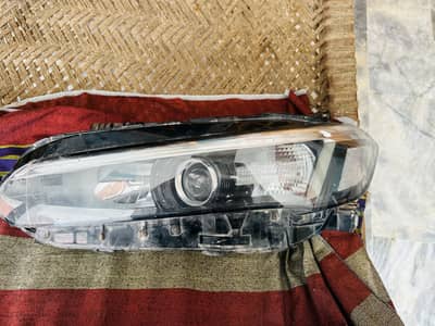 Civic 2023 model head ight little bit broken glass change hoga