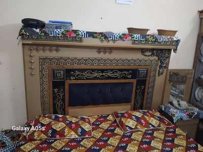 double bed with side tables or dressing or showcase