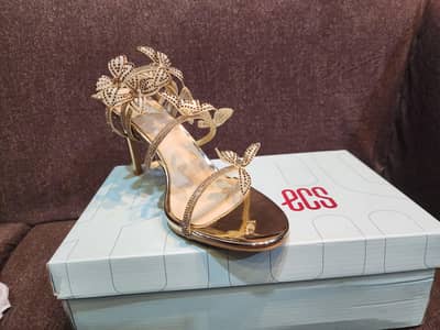 ECS Golden Butterfly Spiral Sandals