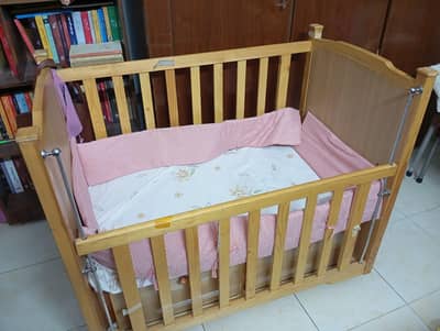 Premium Wooden Baby Crib for Sell (Condition is almost new)