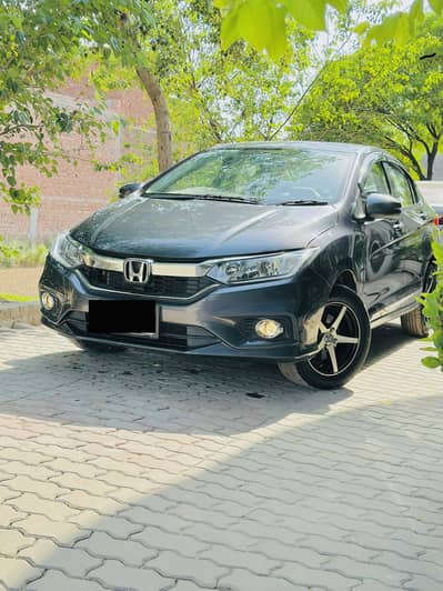 Honda City IVTEC 2025 home use car like new scratch less body bio spot
