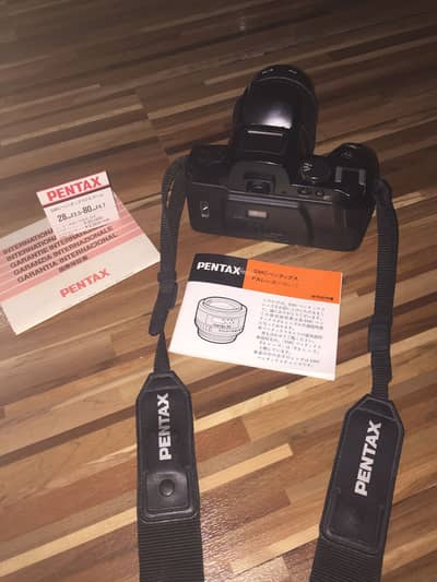 Pentax roll camera with removable lens