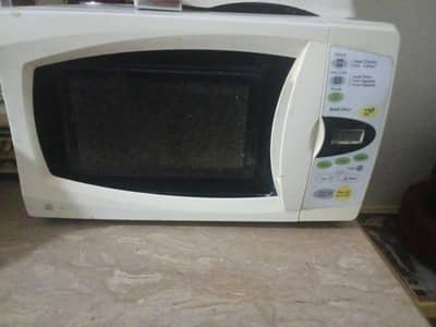 microwave hn used hn la kin achi condition main hn  contact 0332945758