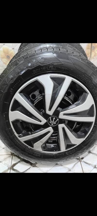 Japanese Rims 13 inch just like brand new along with used tyres, nuts