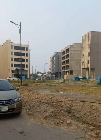 FACING PARKING 4 MARLA COMMERCIAL POSSESSION PLOT WITH COMPLETE FILE AVAILABLE PLOT # E-369/7 COMMERCIAL PLOT LOCATED IN THE BEST BLOCK OF DHA LAHORE.