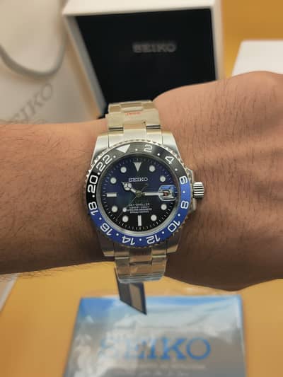 Seiko 5 original Batman GMT with original box and papers