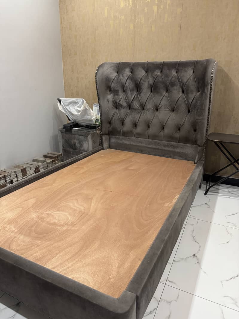 Single bed with one side table 0