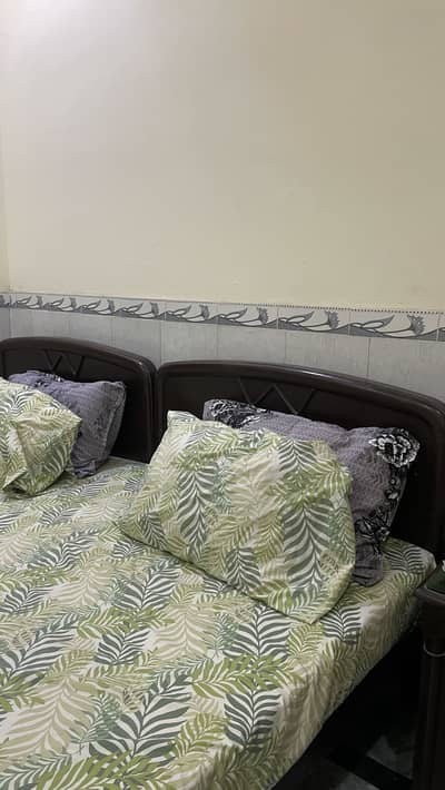 Two single beds (with mattress)