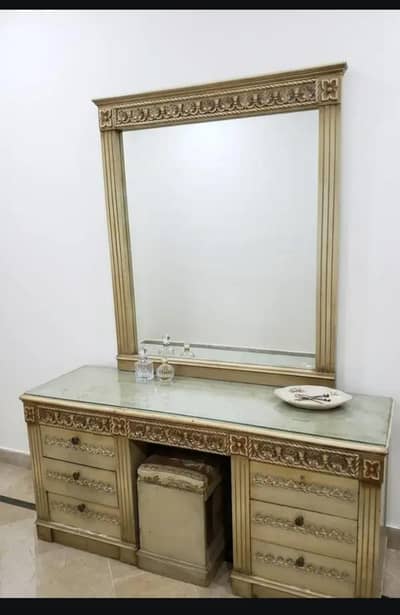 Dressing table in golden color