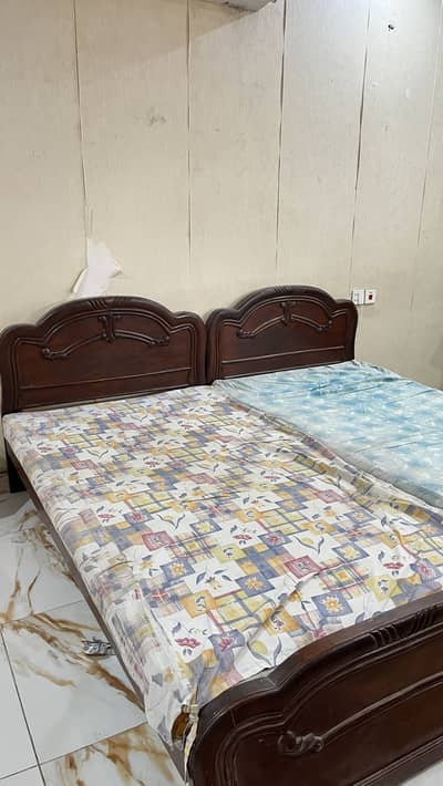 Two single beds with free metress