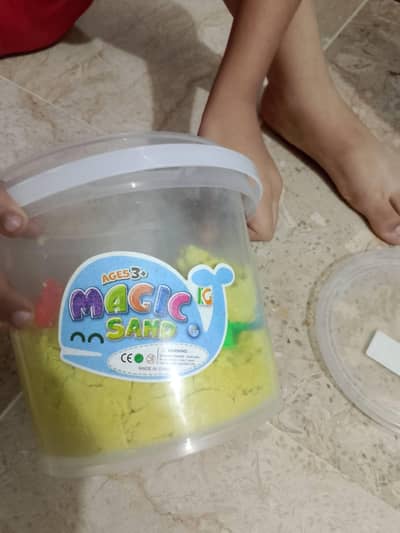 sand for kids and umbrella