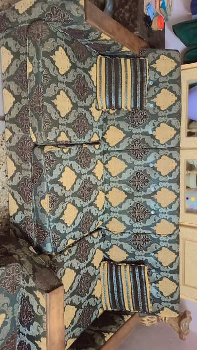 sofa set and 4 wooden chairs
