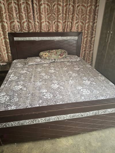 Woden bed with coffee table