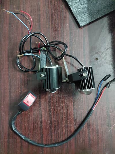 External bike lights with button and clips.