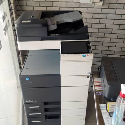 Epson color printer and konica minolta photocopy machine