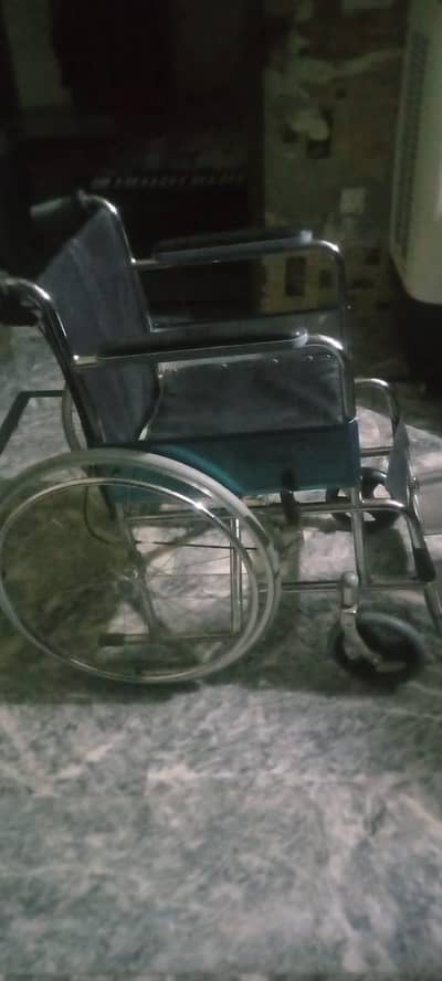 Wheelchair with wheel locks and brakes