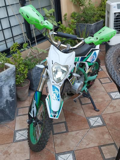 beautiful green petrol trial bike