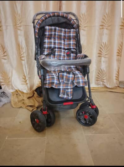 stroller is a foldable and portable