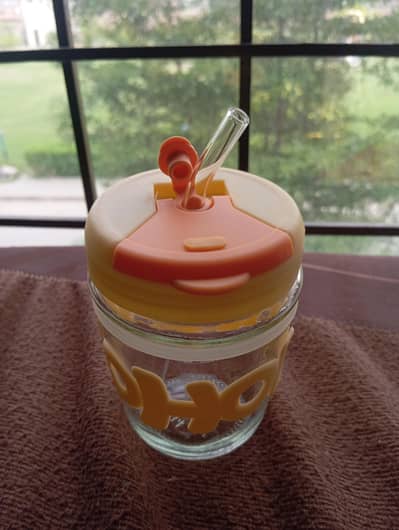 Straw Cup made up of Glass