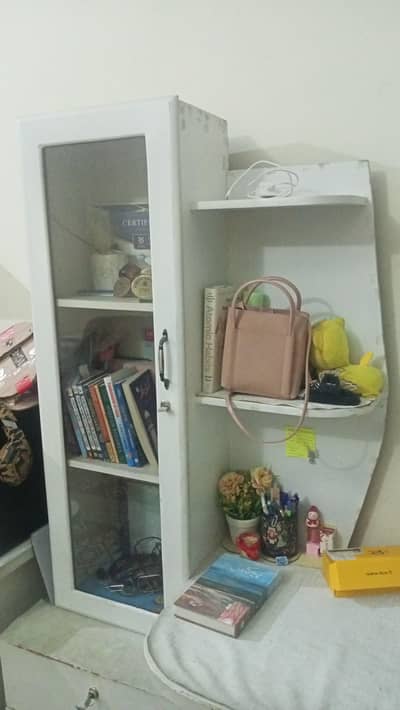 Study Tables, vacuum cleaner, wheat storage box.