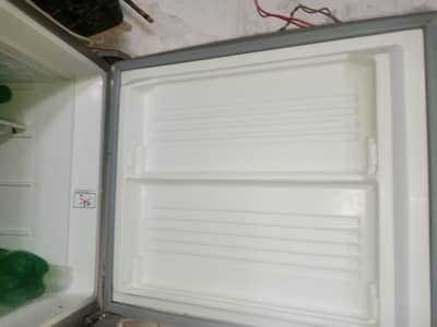 Refrigerator available for sell Dawlance company urgunt need of money