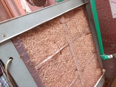 air cooler. used. 26-27 inch width ha. khass and fan blades are new .